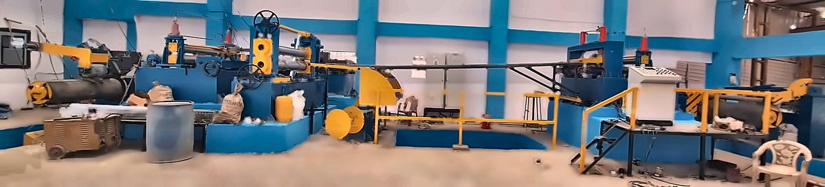 Wide view of the workshop with a coil processing line under assembly