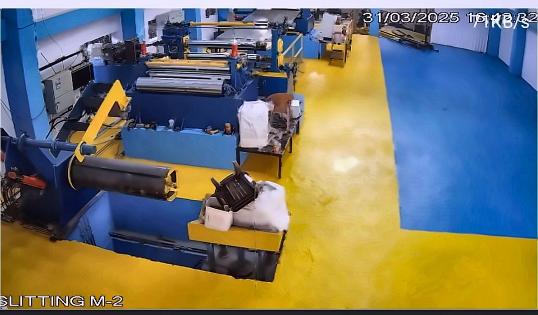 Slitting line in production, second view showing coil and line units